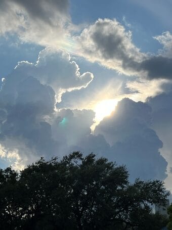 Photo of the sun with clouds