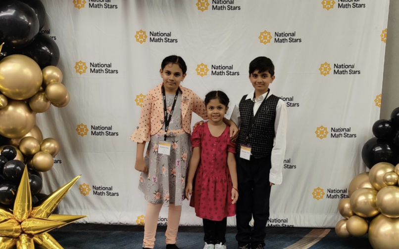 photo of Patel siblings at national math stars competition
