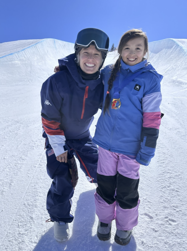 kayley with another person on the slopes